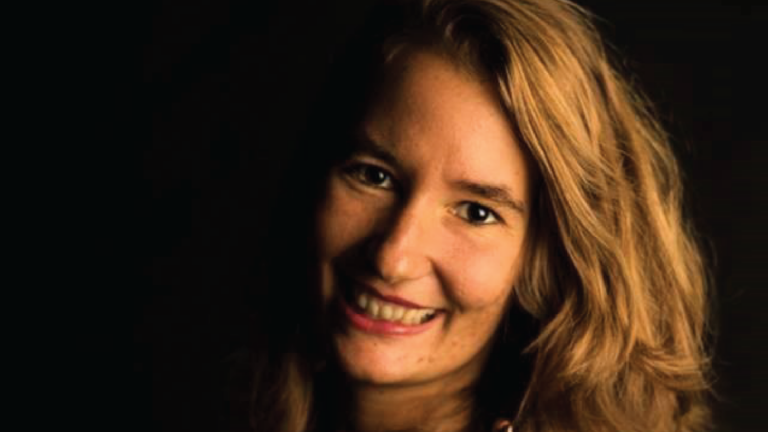 Cropped headshot of Bieke Van Camp.